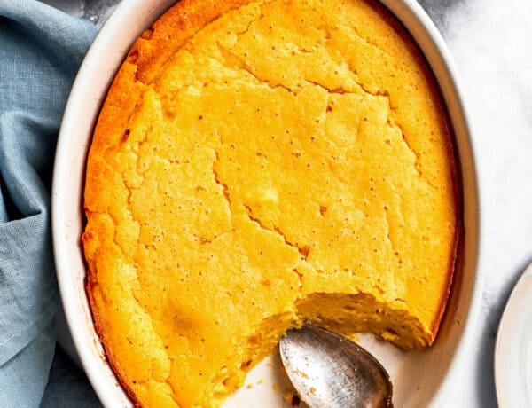 Overhead image of a baking dish with baked Spoon Bread.