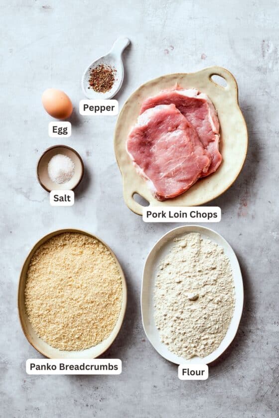 Ingredients for pork katsu are shown portioned out and labeled: pork, panko, salt and pepper, egg, oil, flour.