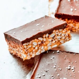 A square bar of rice krispies topped with a layer of melted chocolate.