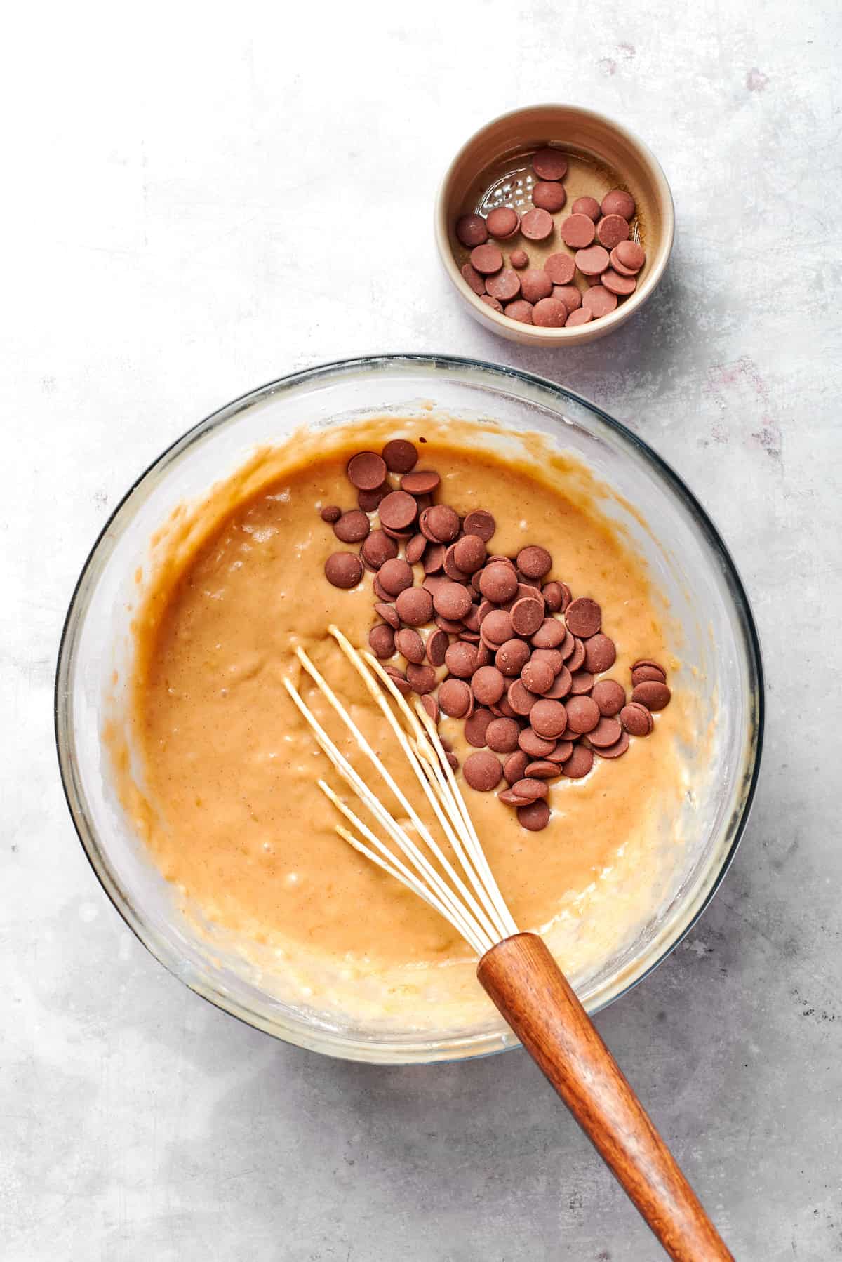 Chocolate chips are stirred into the batter.