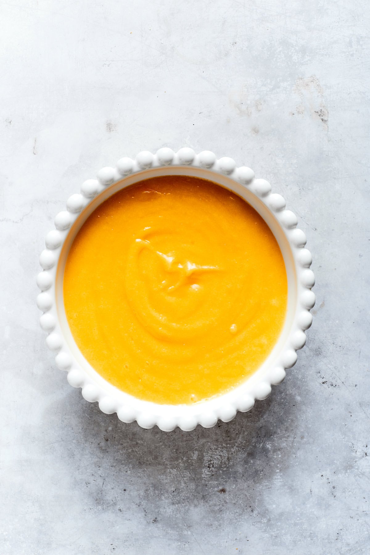 Lemon curd in a bowl.