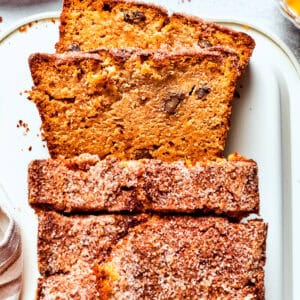 A loaf of Amish friendship bread with three slices cut from it.