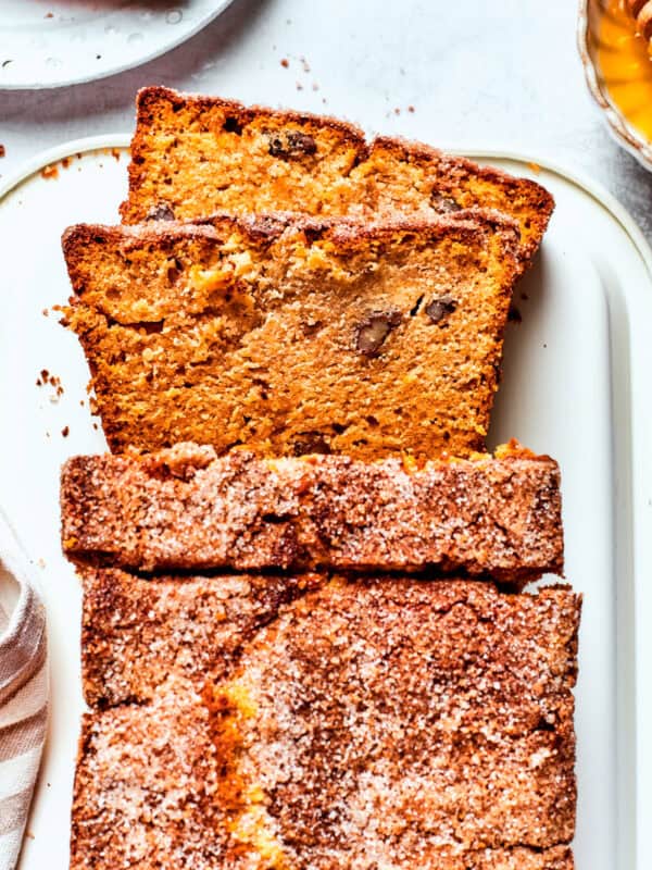 A loaf of Amish friendship bread with three slices cut from it.