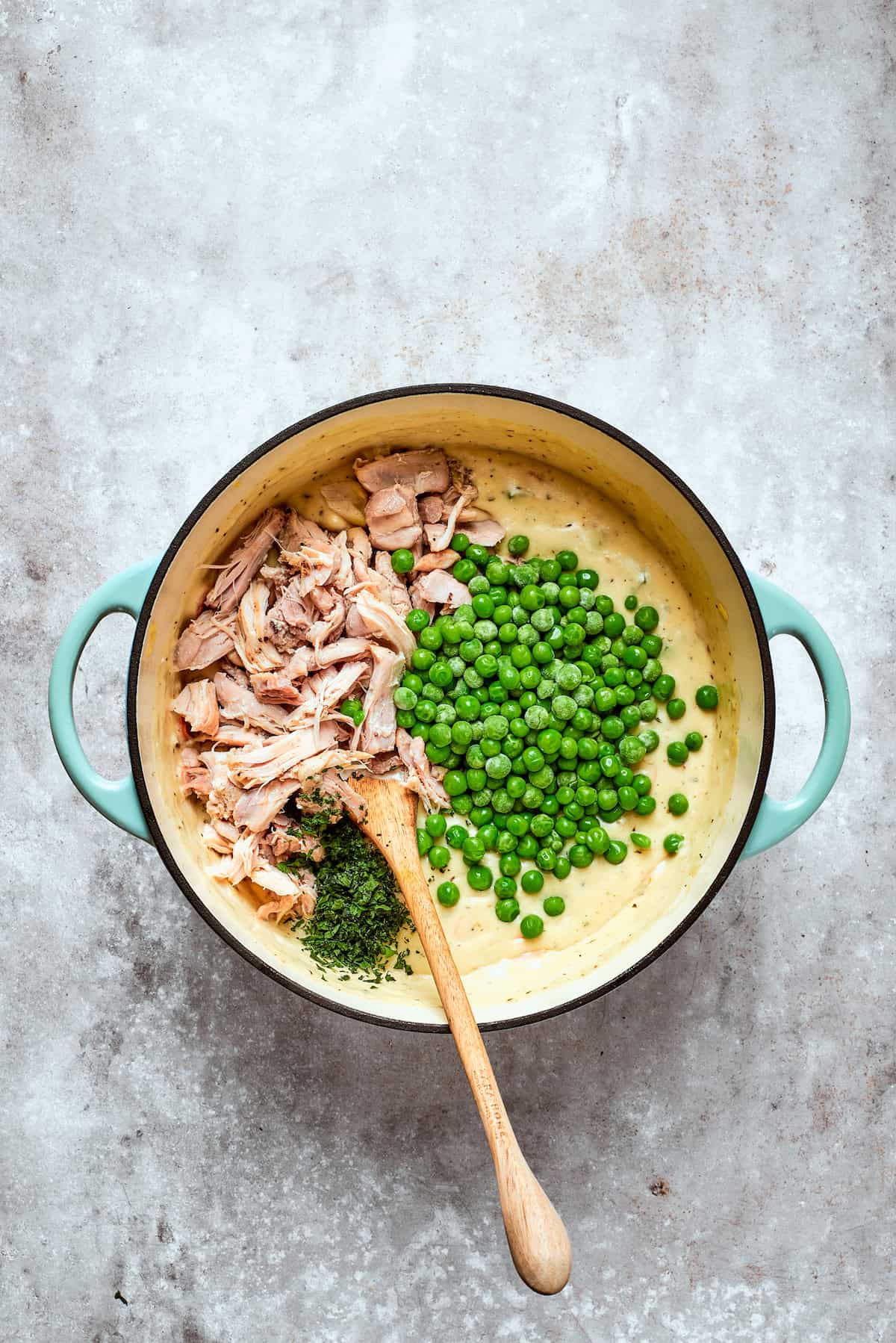 Stir in cooked chicken and peas.