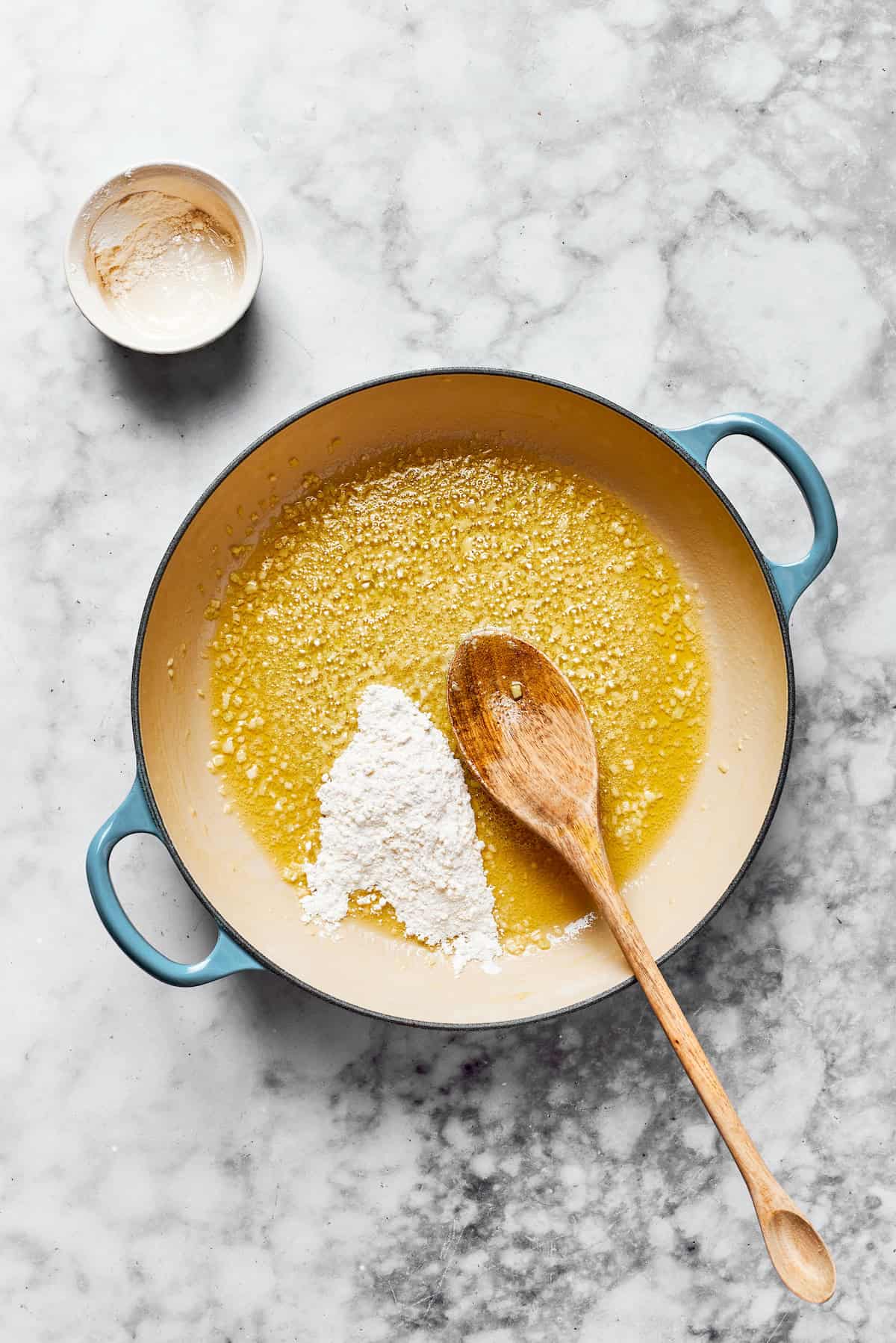 Melted butter and flour in a pan.