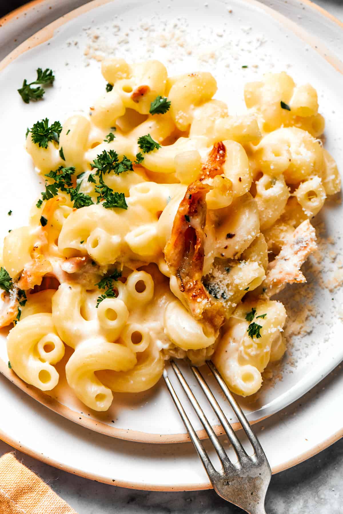 Garlic parmesan chicken pasta served on a dinner plate.