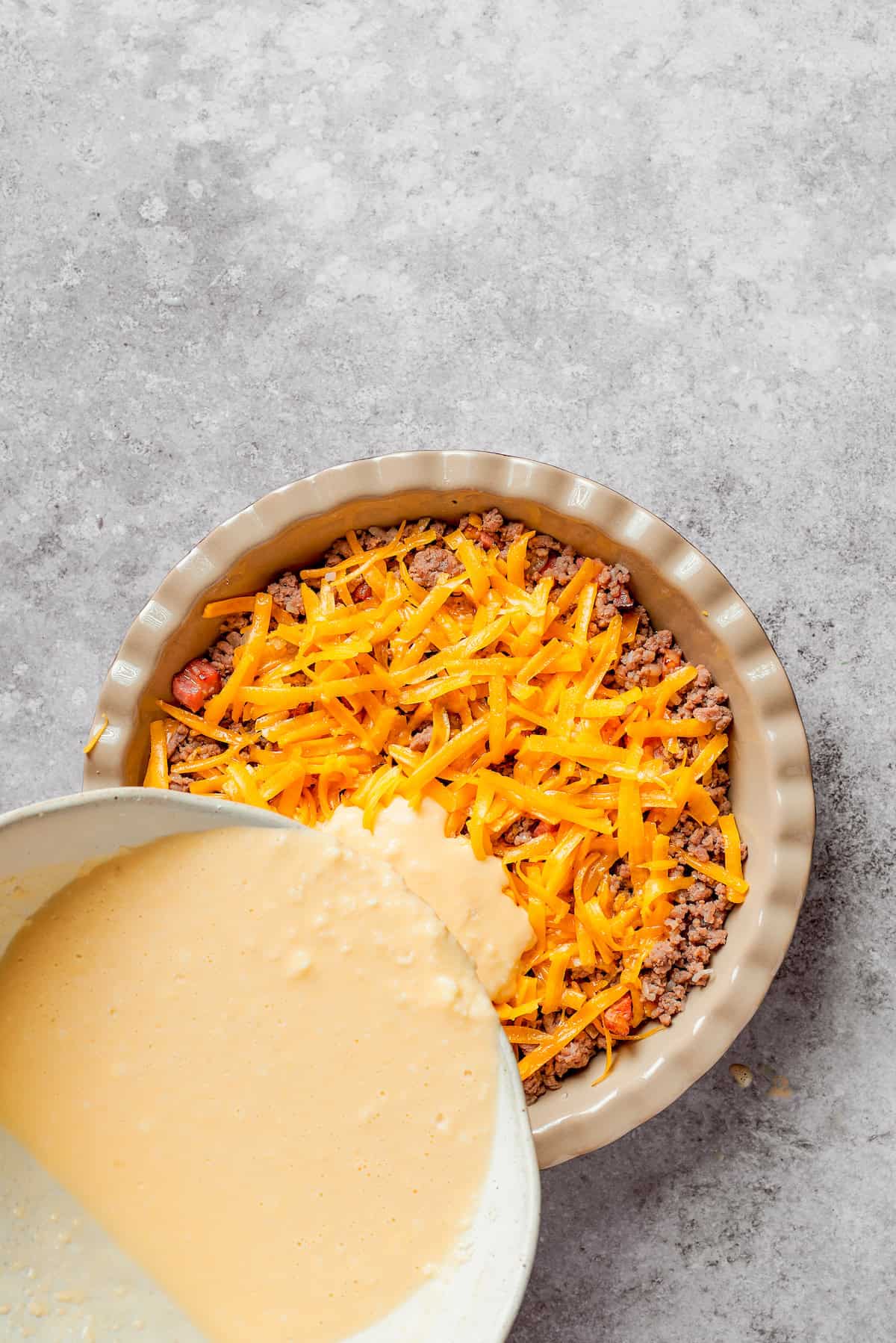 Biscuit mix poured on top of cheeseburger pie filling.