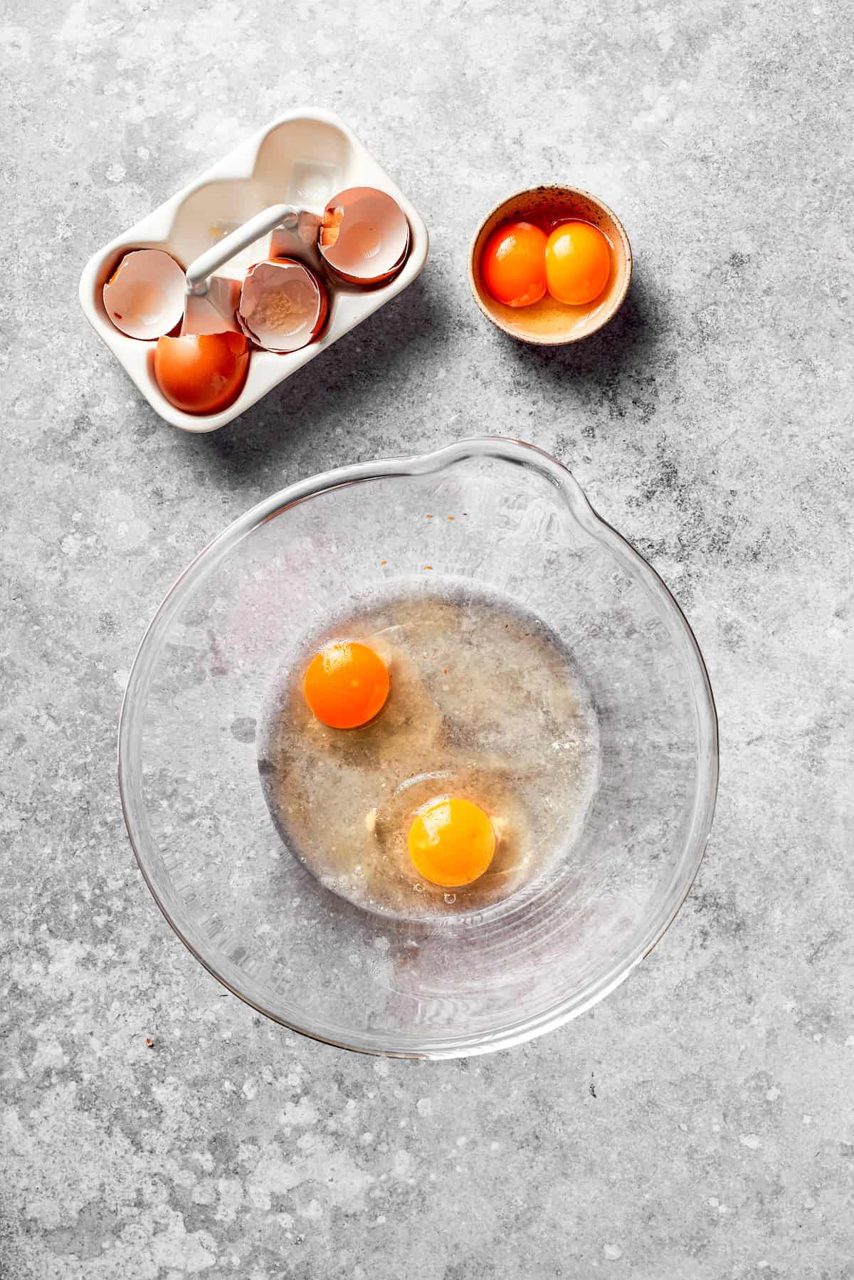 Eggs cracked in a bowl.