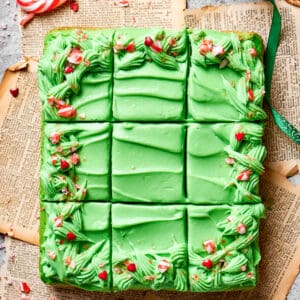 A grinch cake is cut into 12 pieces.