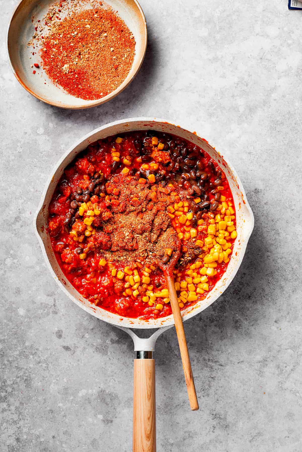 The ground beef mixture for mexican spaghetti in a pan.