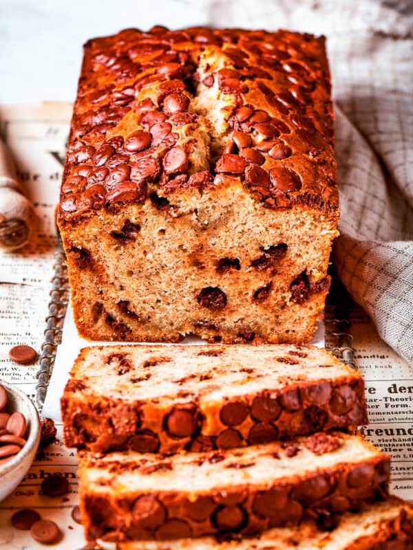 A loaf of banana chocolate chip bread cut into slices.