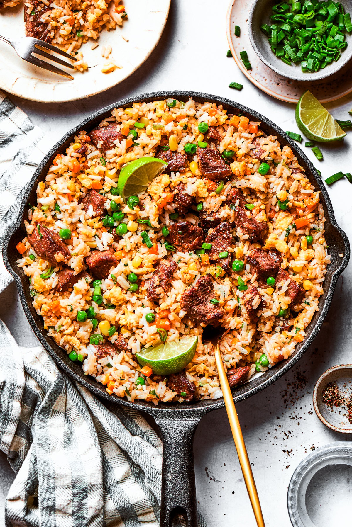 Overhead image of steak fried rice in a skillet.