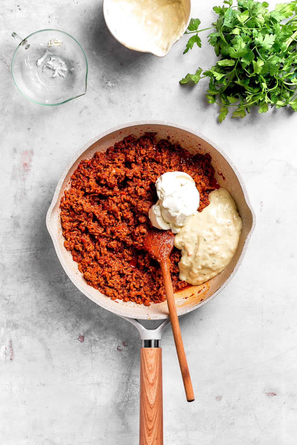 Sour cream and cream soup is added to beef filling.