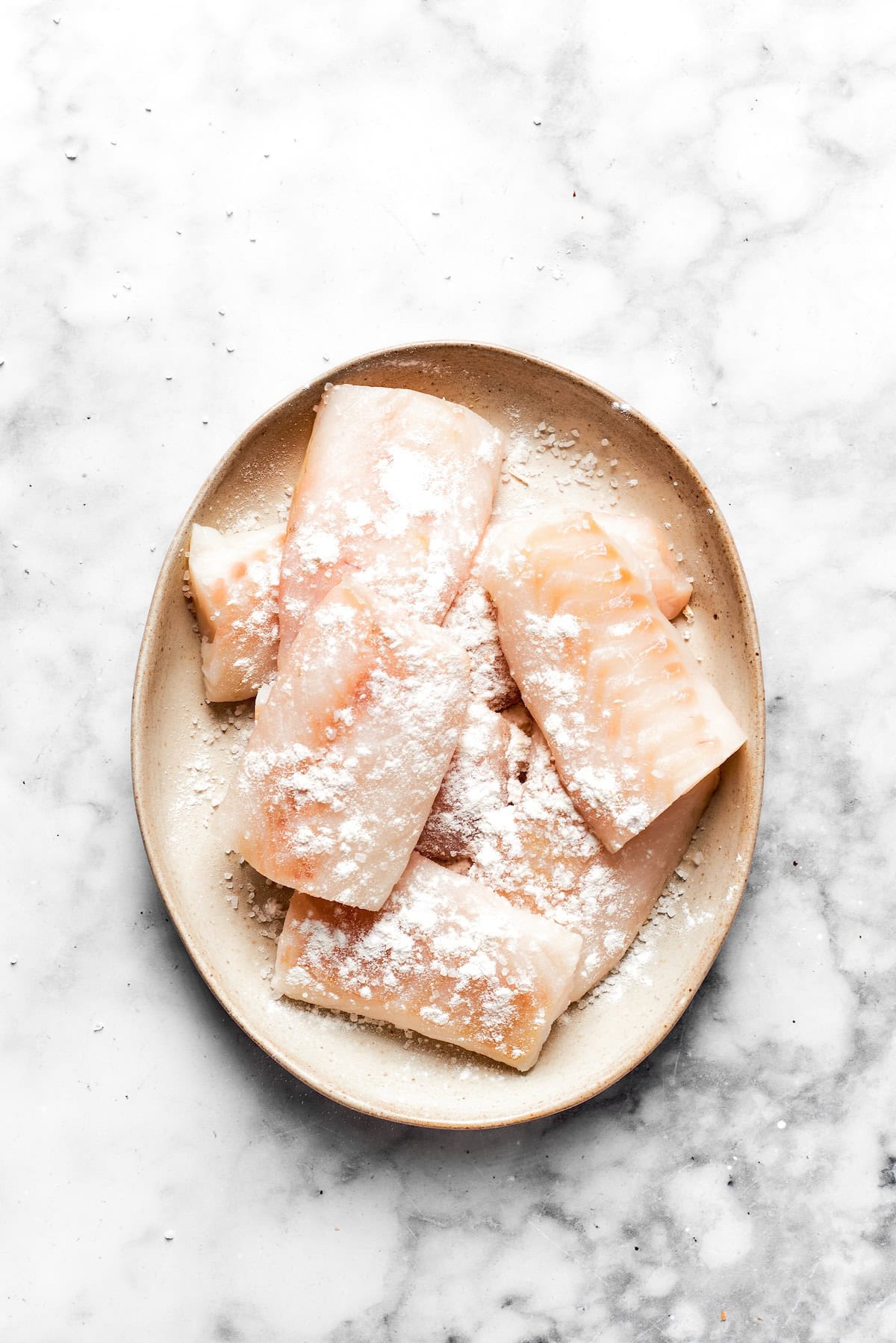 Pieces of fish dredged in flour.