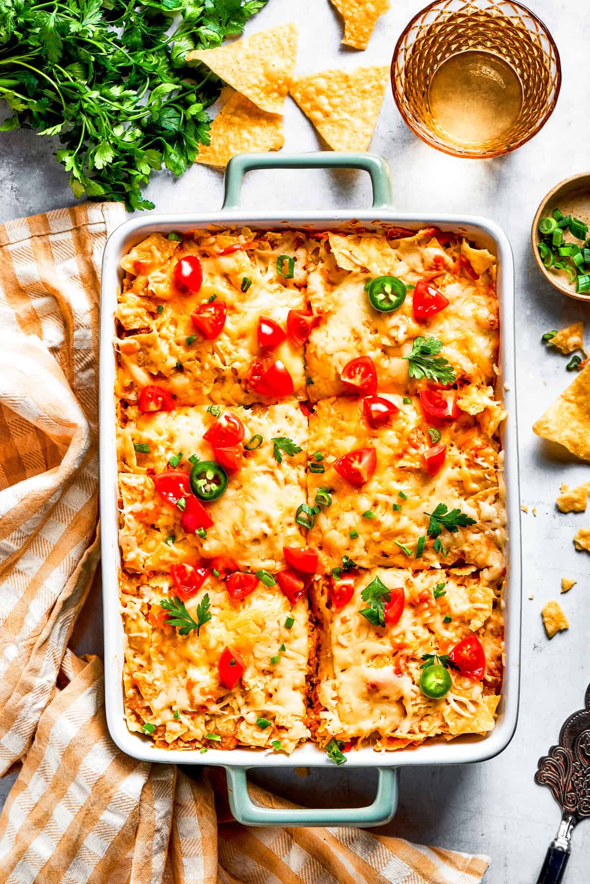 Dorito casserole in a dish, cut up into 6 slices.