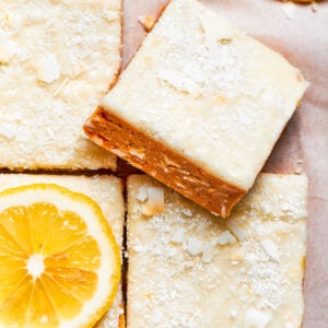 A square of lemon slice on top of other lemon slices.